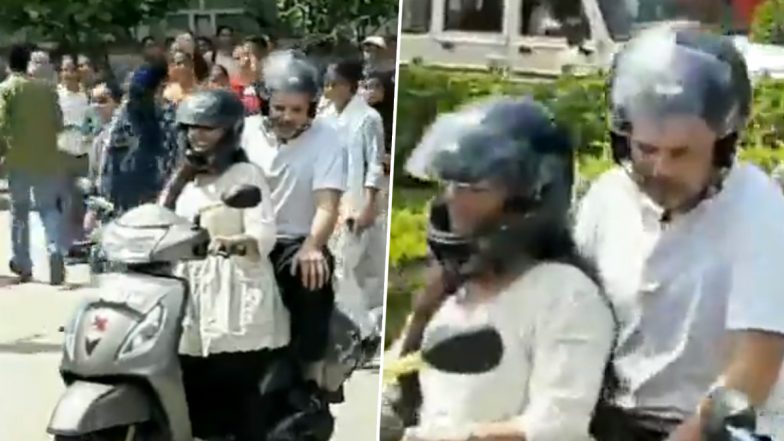 Rahul Gandhi Rides Pillion on a Girl's Scooter After Distributing Two-Wheelers to Meritorious Students at Maharani College in Jaipur (Watch Video)