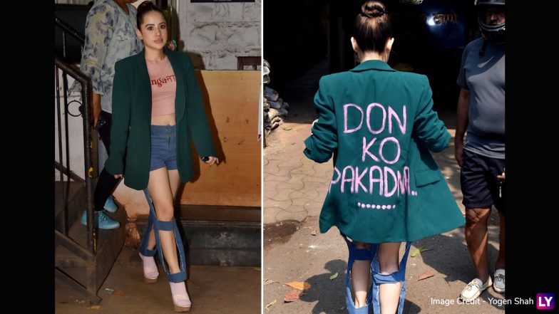 Uorfi Javed Makes Fashion Statement in Oversized Green Blazer With ’Don Ko Pakadna..’ Written on the Back at Bandra Police Station (View Pics)