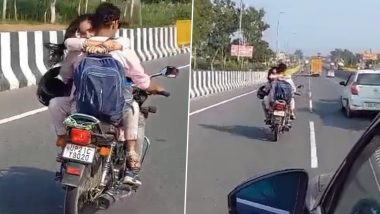 Couple Romance on Bike in UP: Viral Video Shows Woman Hugging Man on Moving Motorcycle on Hapur Road, Police Impose Rs 8,000 Fine on Biker