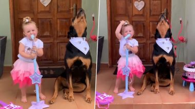 Little Girl and Rottweiler Dog Jam Together, Video of Their Cute Musical Concert Goes Viral (Watch)