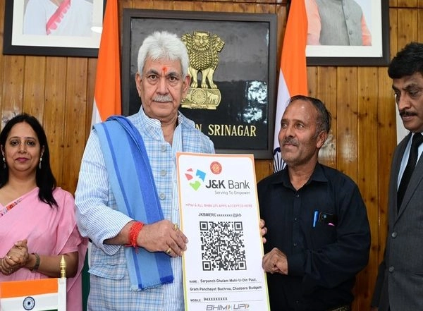 India News | J-K: LG Manoj Sinha Hands over Land Allotment Orders to Beneficiaries of PMAY-G