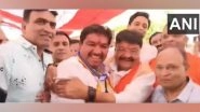 India News | MP: Congress MLA Sanjay Shukla Touches BJP Leader Kailash Vijayvargiya's Feet at Indore Event