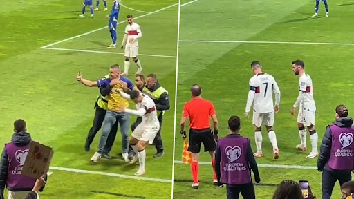 Pitch Invader Steps On Cristiano Ronaldo's Foot While Trying to Take A Selfie During BIH vs POR UEFA Euro 2024 Qualifier Match, Video Goes Viral!