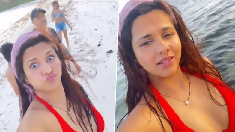 Dalljiet Kaur Flaunts Her Hot Bod in Sexy Red Bikini As She Enjoys Vacay With Family (Watch Video)