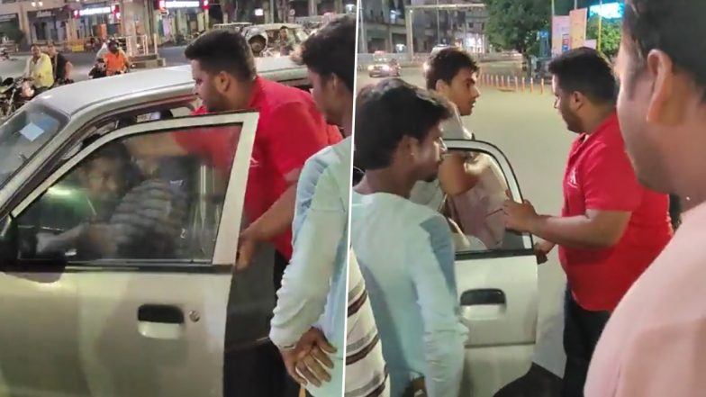 Lucknow: 'Miscreants' Drag Two Men Out of Their Car in Middle of Road, Get Into Verbal Argument With Cops (Watch Videos)