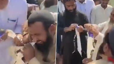 Pakistani Protestors Show Support Towards Palestine in Unique Way, Tear Israeli Flag by Biting Amid War Between Israel and Hamas, Viral Video Surfaces