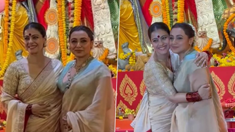 Kajol Hugs Rani Mukerji As They Pose Together for the Paparazzi at North Bombay Sarbojanin Durga Puja Pandal (Watch Video)