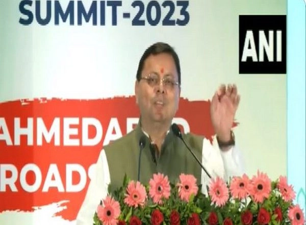 India News | In Pitch to Investors at Ahmedabad Roadshow, CM Dhami Likens Uttarakhand with Sanatan