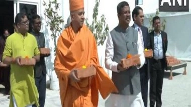 World News | Union Minister Dharmendra Pradhan Visits BAPS Hindu Mandir in Abu Dhabi