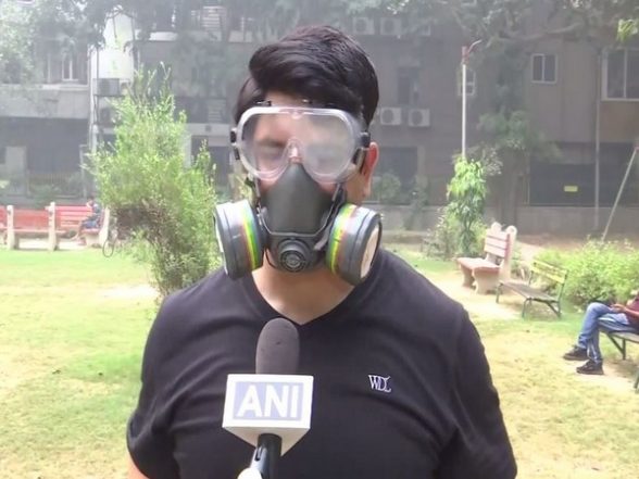 India News | BJP's Shehzad Poonawala Dons Gas Mask, Claims Smog Tower in Delhi Non-functional - Vimarsana News