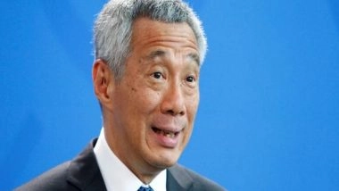 World News | Singapore PM Lee Hsien Loong to Hand over Leadership to Deputy PM Lawrence Wong Before Next Elections