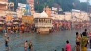 India News | Haridwar: Devotees Take Holy Dip in River Ganga on the Occasion of Somvati Amavasya