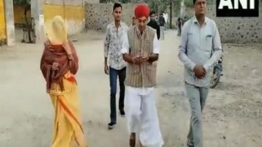 India News | Rajasthan: Former Congress MP Manvendra Singh Castes Vote at Mewa Nagar in Barmer District