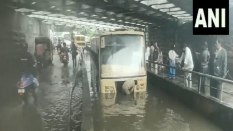 Chennai Rains: Bus Stuck Under Subway in Moolakkothalam, Traffic Affected as Heavy Rainfall Disrupt Normal Life (Watch Video)