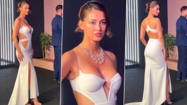 Disha Patani Flaunts Her Curves and Cleavage in White Strapless Cut-Out Spaghetti Strap Dress With Thigh-High Slit! (Watch Video)