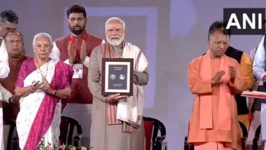 PM Narendra Modi With Uttar Pradesh CM Yogi Adityanath Releases New Commemorative Coin and Stamp On 525th Birth Anniversary of Saint Meera Bai in Mathura (Watch Videos)