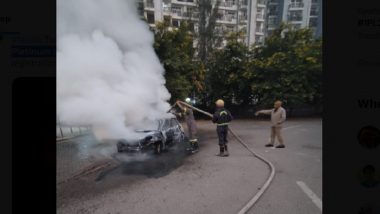 Car on Fire in Noida: Two Dead After Blaze Erupts in Maruti Swift Car Outside Amrapali Platinum Society in Sector 119 (Watch Videos)