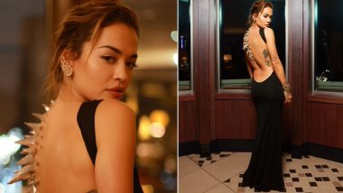 Rita Ora Rocks a Futuristic Vibe in Edgy Chrome Spine Ensemble and Sleek Black Bodycon Dress With a Plunging Back – See Pics