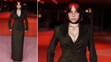 Billie Eilish Redefines Style in Pinstriped Skirt Suit, Silk Scarf, and Glasses (View Pics)