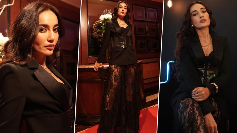 Surbhi Jyoti Unleashes Gothic Vibes in Black Corseted Ensemble With Sheer Lace Tulle and Curly Brown Waves – See Pics!