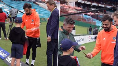 Virat Kohli Signs Autograph on RCB Jersey for A Young Fan Ahead of IND vs SA 1st Test 2023 Day 2 (Watch Video)