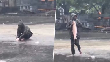 Chennai: Man Catches Fish on Middle of Road Amid Intense Flood and Rain Due to Cyclone Michaung, Video Surfaces