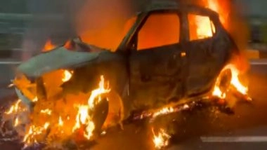 India News | Speeding Car Overturns, Catches Fire on Highway; 2 Sustain Minor Burns