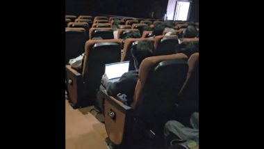 It Happens Only in Bengaluru! Man Spotted Working on Laptop Inside a Movie Theatre, Video Goes Viral