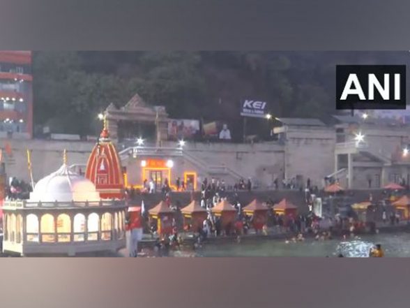 India News | Uttarakhand: Devotees Throng Temples, Take Holy Dip in Ganga on New Year - Vimarsana News