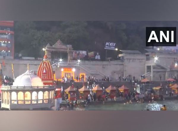 India News | Uttarakhand: Devotees Throng Temples, Take Holy Dip in Ganga on New Year