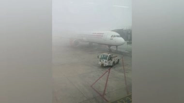 India News | Air India Passengers Stranded for 8 Hours Inside Plane Due to Adverse Weather