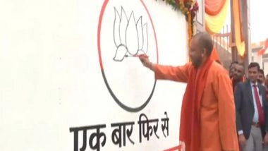 India News | UP CM Yogi Adityanath Participates in BJP's 'Ek Baar Phir Se Modi Sarkar' Wall Writing Campaign