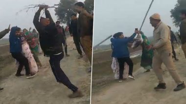 Fight Over Land Dispute in Hardoi: Village Pradhan, His Wife Thrashed While Cops Watch in Uttar Pradesh, Probe Launched After Video Goes Viral