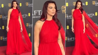Dua Lipa Slays at the BAFTAS 2024 in a Fiery-Red Gown With a Cape by Valentino (View Pics and Video)