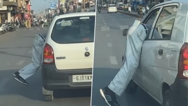 Parking Attendant Manhandled in Ahmedabad: Car Driver Drags Man Into Car, Drives Vehicle for 100 Meters Before Throwing Victim on Road for Demanding Parking Charges; Video Surfaces