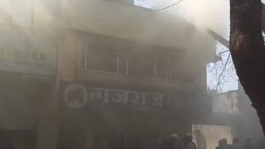 Pune Fire: Massive Blaze Erupts in a Shop in Market Yard Area Near Gate Number 10, Fire Tenders Present at Spot (Watch Video)