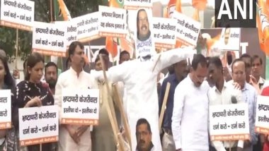 India News | BJP Holds 'Holika Dahan' of Corruption in Delhi; Attacks AAP, Kejriwal