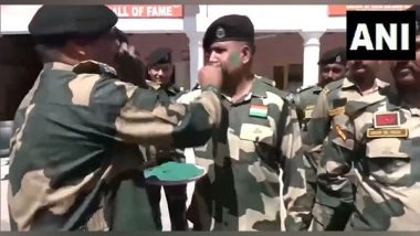 India News | J-K: BSF Jawans Smear Fellow Comrades with Colours During Holi Celebrations at International Border