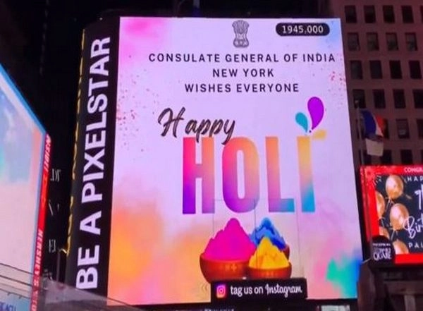 World News | US: Times Square Illuminates with Wishes for Holi Festival