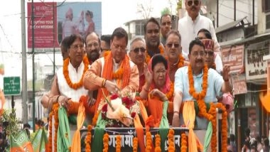 India News | Uttarakhand CM Dhami Holds Roadshow in Dehradun Ahead of Lok Sabha Polls