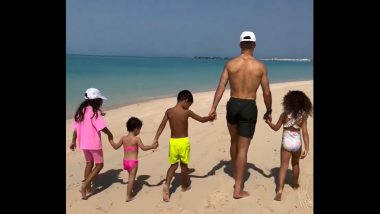 ‘Close to Heaven’ Cristiano Ronaldo Enjoys Day Out With Family at the Beach, Goes for a Walk Alongside His Kids (Watch Video)