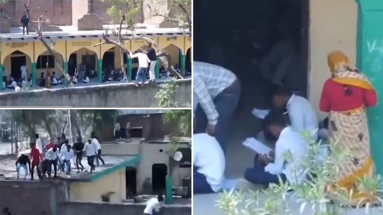 Haryana Board Exams 2024: Mass Cheating Reported During Class 10 Examination in Nuh, Video Shows People Climbing Walls to Pass Chits (Watch Video)