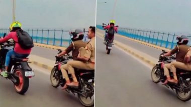 Kanpur Bike Stunt Video: Man Performs Dangerous Stunt on Bike As Cops Watch in UP, Probe Launched After Viral Clip Surfaces