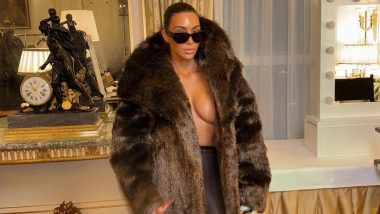Kim Kardashian Goes Braless, Channels Mob Wife Vibes in an Oversized Fur Coat and Black Tights (View Pic)