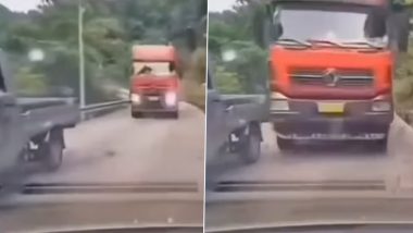 Car Driver Narrowly Misses Collision With Massive Truck Approaching From Opposite Direction on One-way Road on Hill, Chilling Video Surfaces