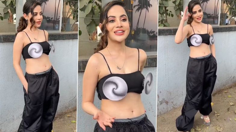 Uorfi Javed Looks Summer Ready in Black Short Top Adorned With Rotating Discs; Internet Sensation Engages in Fun Chat With Paps As She Rocks Her New Look (Watch Video)