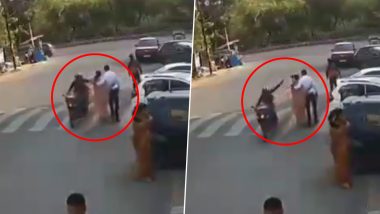 Chain Snatching Caught on Camera in Noida: Miscreant on Sports Bike Snatches Woman’s Chain in Sector 49, CCTV Footage Surfaces