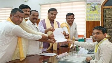 India News | Assam CM Sarma Rallies Support for BJP's Kripanath Mallah as He Files Nomination from Karimganj