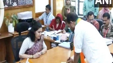 India News | Kerala BJP Chief K Surendran Holds Roadshow with Smriti Irani in Wayanad, Files LS Nomination