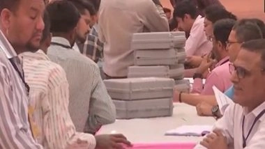 India News | Lok Sabha Elections: EVMs Distributed to Poll Parties in Ahmedabad